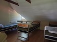 V�su maja fotogalerii Tuba nr 5 (teisel korrusel)Tuba l�bi kahe korruse - pildil voodid toa teis